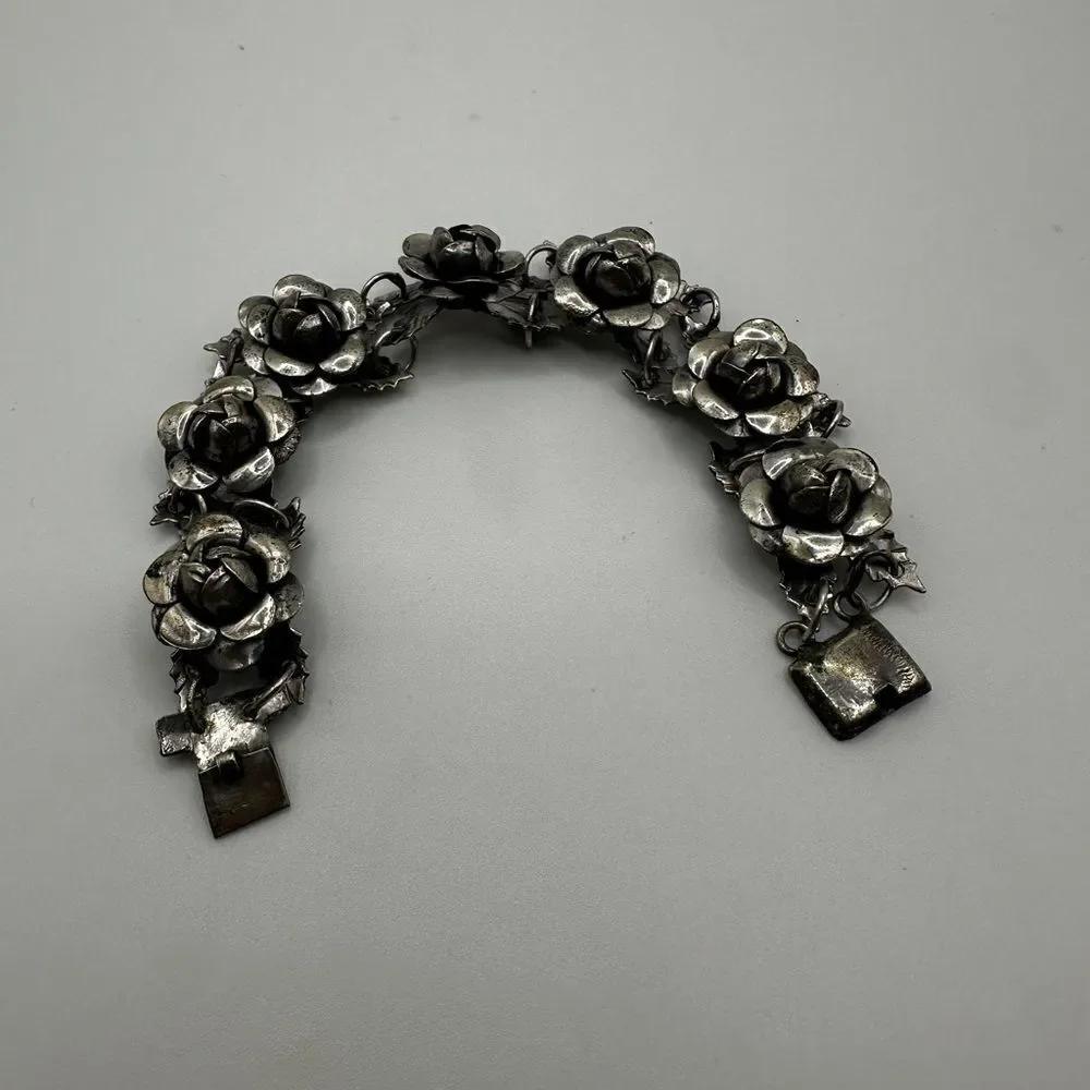 Vintage flower and‎ leaf bracelet stamped “silver made” Mexico!